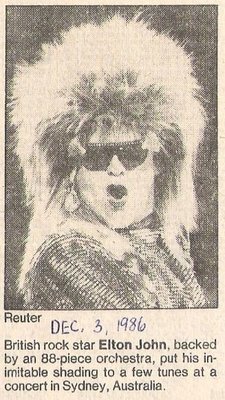 John, Elton / Backed by An 88-Piece Orchestra | Magazine Photo with Caption (1986)