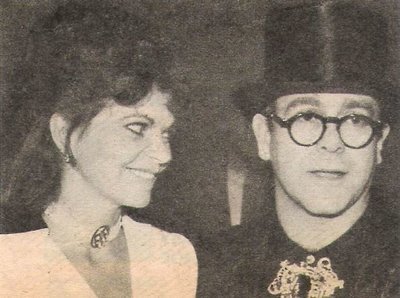 John, Elton / With Wife Renate Backstage at Madison Square Garden | Newspaper Photo (1986)