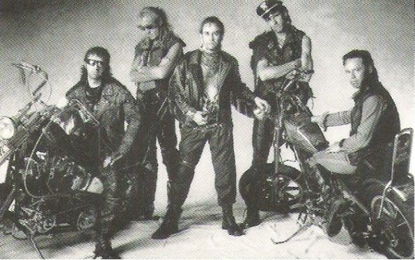 John, Elton / Elton + Band With Two Motorcycles | Magazine Photo (1986)