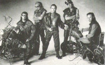 John, Elton / Elton + Band With Two Motorcycles | Magazine Photo (1986)