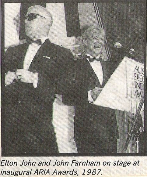 John, Elton / At ARIA Awards with John Farnham | Magazine Photo with Caption (1987)