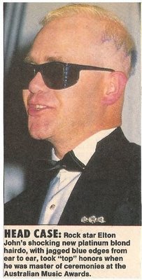 John, Elton / Head Case: Shocking New Hairdo | Magazine Photo with Caption (1987)