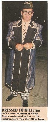 John, Elton / At Nicky Blair&#39;s Restaurant, L.A. #1 | Magazine Photo with Caption (1987)