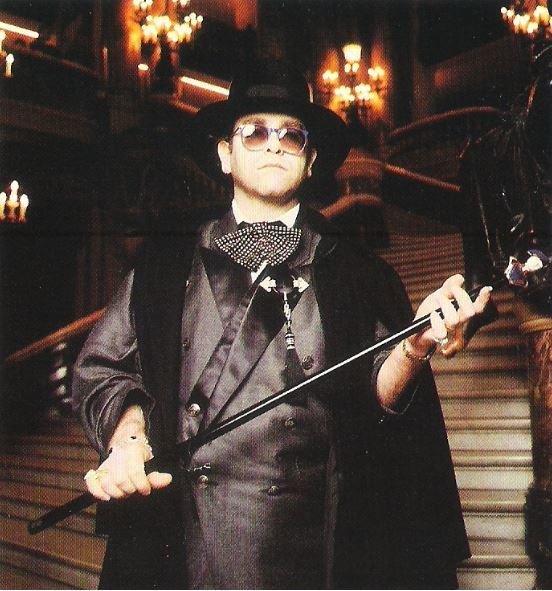 John, Elton / Standing By Stairway with Black Cane - Ice On Fire Era | Magazine Photo (1985)