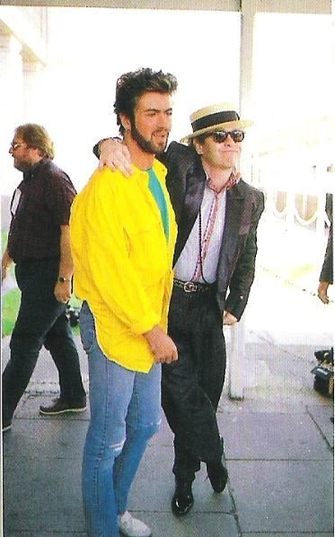 John, Elton / At Live-Aid, Wembley Stadium #6 | Magazine Photo (1985) / with George Michael