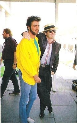 John, Elton / At Live-Aid, Wembley Stadium #6 | Magazine Photo (1985) / with George Michael