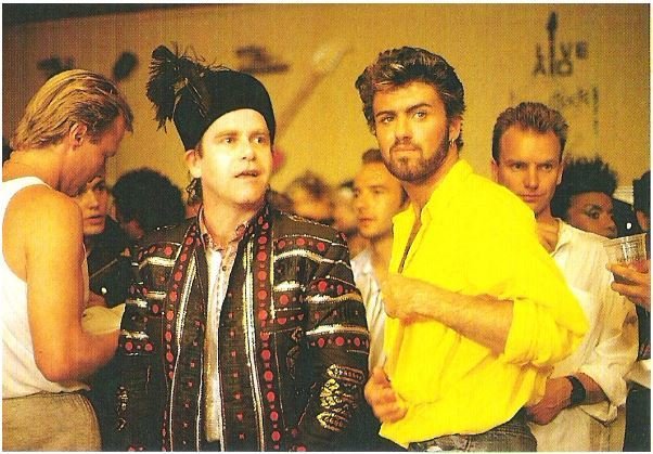 John, Elton / At Live-Aid, Wembley Stadium #7 | Magazine Photo (1985) / with George Michael + Sting