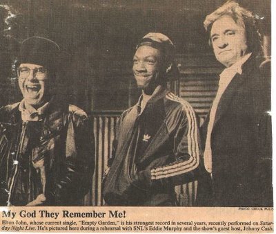 John, Elton / On Saturday Night Live | Magazine Photo with Caption (1982) / with Eddie Murphy + Johnny Cash