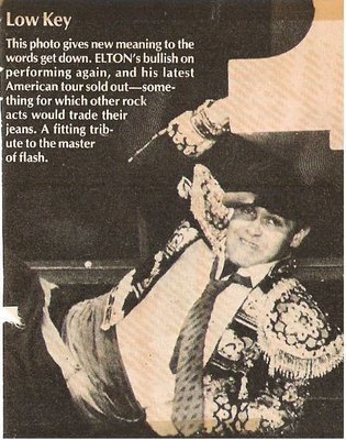 John, Elton / Low Key | Magazine Photo with Caption (1982)