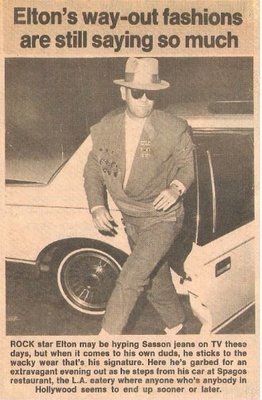 John, Elton / Elton&#39;s Way-Out Fashions Are Still Saying So Much | Newspaper Photo with Caption (1984)