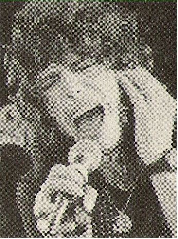 Aerosmith / Steven Tyler On Stage, Holding Hand to Ear | Magazine Photo (1979)
