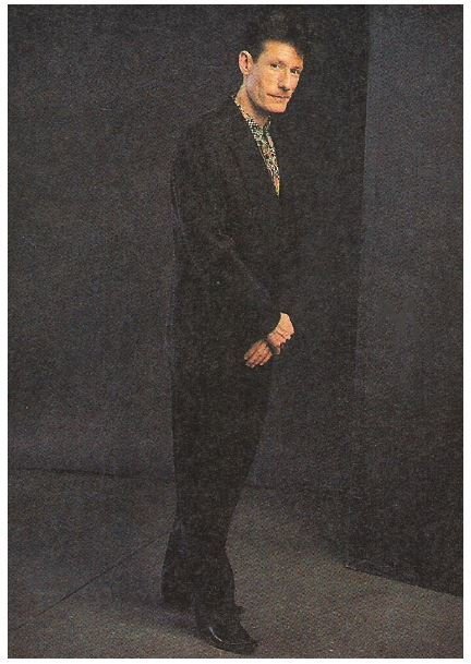 Lovett, Lyle / Black Washed Silk Double-Breasted Suit | Magazine Photo | 1992