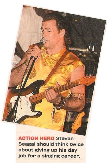 Seagal, Steven / Should Think Twice About Giving Up His Day Job | Magazine Photo with Caption | 2002