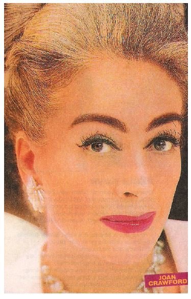 Crawford, Joan / White Earrings and Necklace - Closeup | Magazine Photo with Caption | 2002