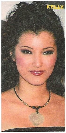 Hu, Kelly / Seashell Necklace, Black Top, Closeup | Magazine Photo | 2002