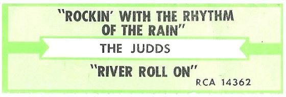 Judds, The / Rockin' With the Rhythm of the Rain | RCA 14362 | Jukebox Title Strip | May 1986