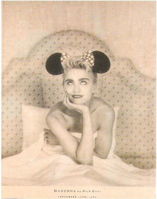 Madonna / On Bed Wearing Mickey Mouse Ears | Magazine Photo | September 1987