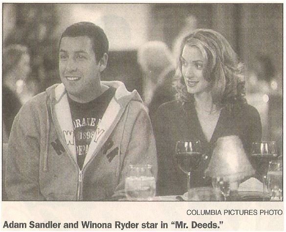 Sandler, Adam / Adam Sandler and Winona Ryder star in Mr. Deeds | Newspaper Photo with Caption | May 2002