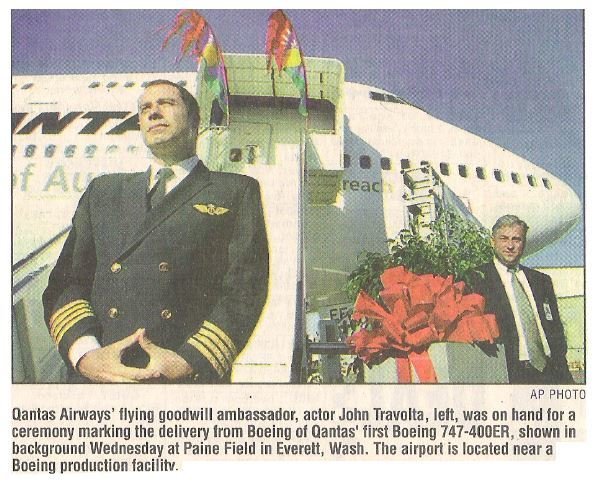 Travolta, John / Qantas Airways&#39; Flying Goodwill Ambassador | Newspaper Photo with Caption | October 2002