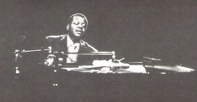 Peterson, Oscar / On Stage - At Piano - Eyes Closed | Magazine Photo | Undated