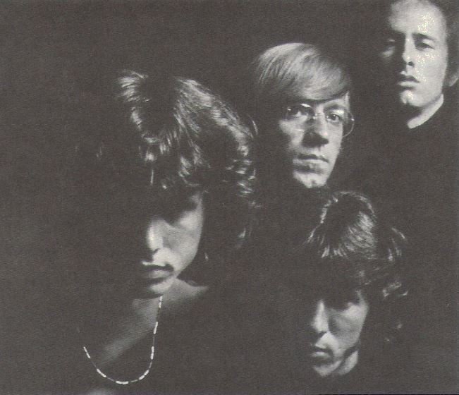 Doors, The / Dark Background - Jim at Left - Faces | Magazine Photo | 1967