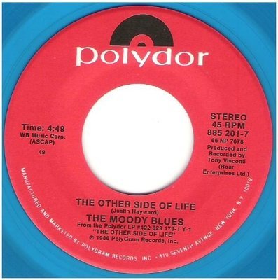 Moody Blues, The / The Other Side of Life | Polydor 885 201-7 | Single, 7&quot; Vinyl | Blue Vinyl | August 1986
