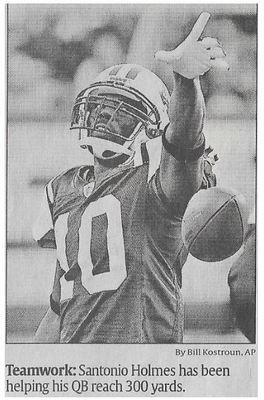 Holmes, Santonio / Teamwork | Newspaper Photo | November 2010 | New York Jets