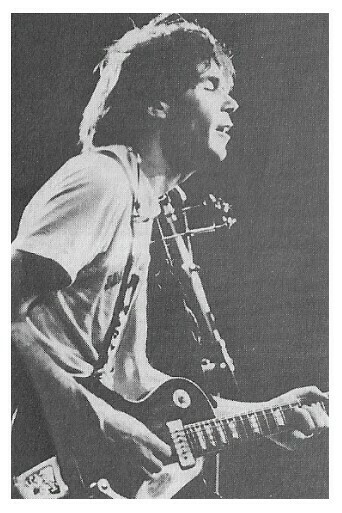Young, Neil / On Stage-Profile-Eyes Closed-Guitar / 1970s