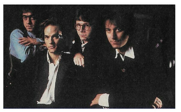R.E.M. / Group Photo-Bill Berry in Blue Shirt On Left / 1989