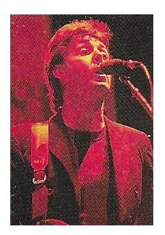 McCartney, Paul / On Stage, Singing Into Mic.