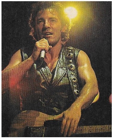 Springsteen, Bruce / On Stage-Black Vest-Holding Microphone and Guitar / 1989