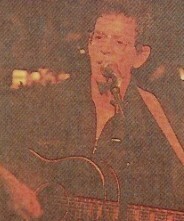 Reed, Lou / On Stage, Orange Lighting, Acoustic Guitar / 1992
