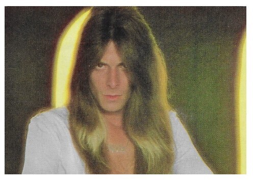Angel / Gregg Guiffria-Closeup-Black-Yellow Background / 1978
