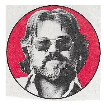 Rogers, Kenny / Closeup-Wearing Glasses-Red Background