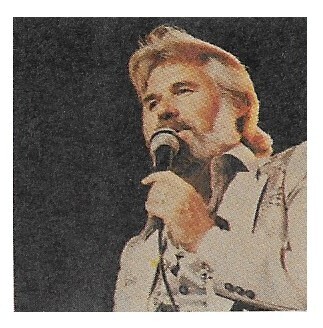 Rogers, Kenny / On Stage-Singing Into Microphone