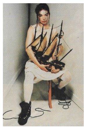 Bjork / Sitting--Holding Model Ship / 1993