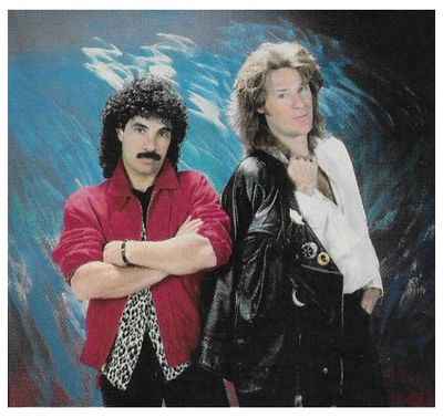 Hall + Oates / Daryl at Right Holding Black Jacket / 1988
