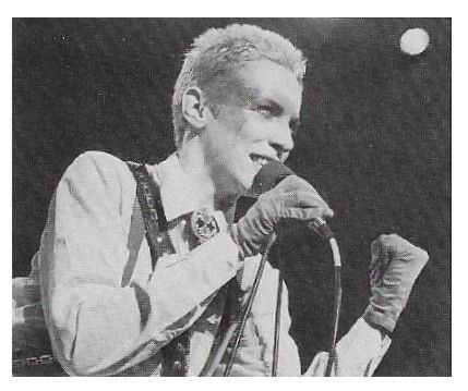 Eurythmics / Annie Lennox: On Stage--Left Fist Clenched / 1983
