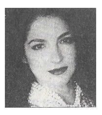 Estefan, Gloria / Closeup--Wearing Necklaces / 1990