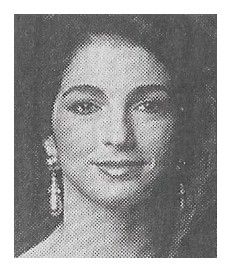 Estefan, Gloria / Closeup--Wearing Large Earrings