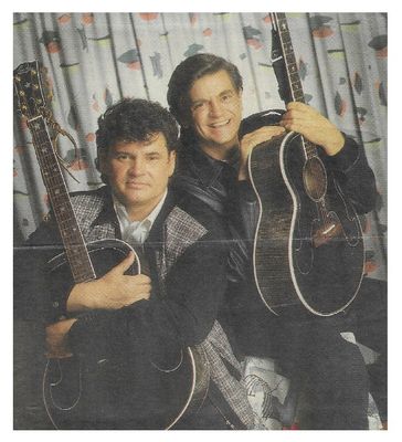 Everly Brothers, The / Both Sitting--Holding Guitars / 1986