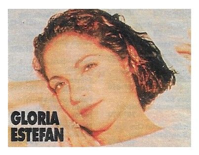 Estefan, Gloria / Closeup, Wearing White, Name at Bottom Left