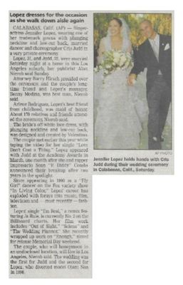 Lopez, Jennifer / Lopez Dresses for the Occasion as She Walks Down Aisle Again / 2001
