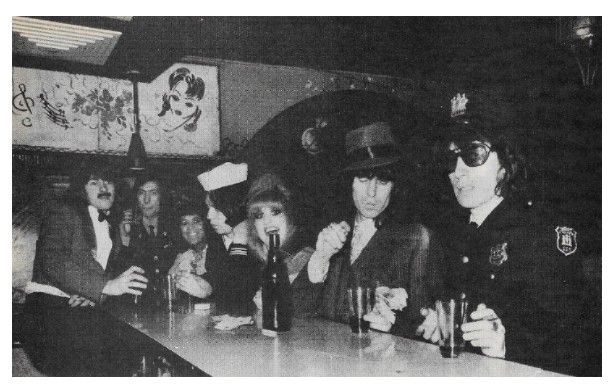 Rolling Stones, The / At the Bar, Bill Wyman at Right / 1970s