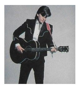 Earle, Steve / Standing--Black Acoustic Guitar / 1986
