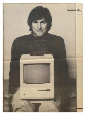 Jobs, Steve / Holds Baby Macintosh / 1984