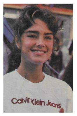 Shields, Brooke / Closeup--Wearing Calvin Klein Jeans T-Shirt / 1981