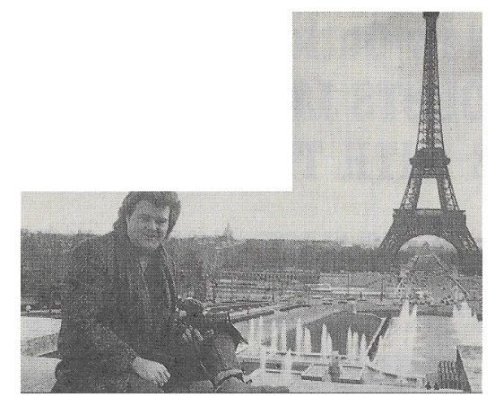 Skaggs, Ricky / Holding Camera--Paris, France / 1986
