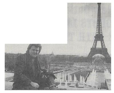 Skaggs, Ricky / Holding Camera--Paris, France / 1986