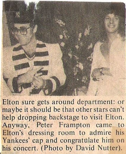 John, Elton / With Peter Frampton, Backstage, Wearing Yankees Cap / 1976